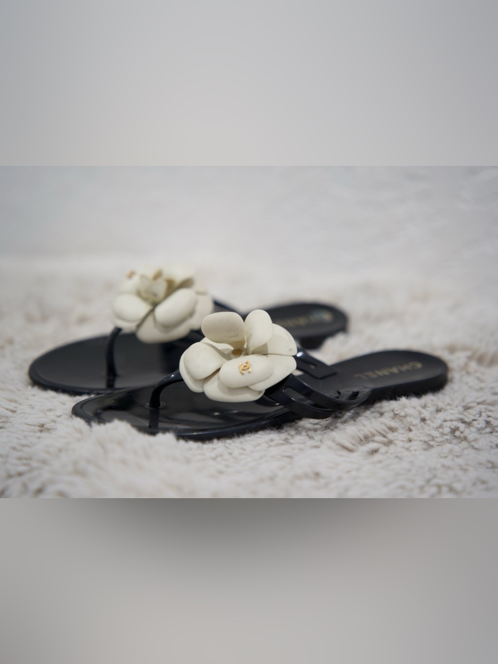 CHANEL Black Jelly Thong Sandals with White Camellia
